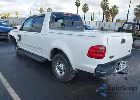 2002 Ford F-150 Lariat/Xlt z USA, uszkodzony, nr VIN 1FTRW07L52KC14592